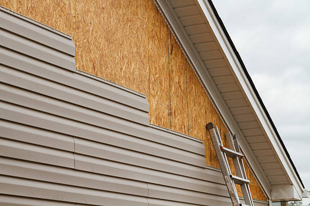 Professional Siding Contractor technician working in Fannettsburg, PA